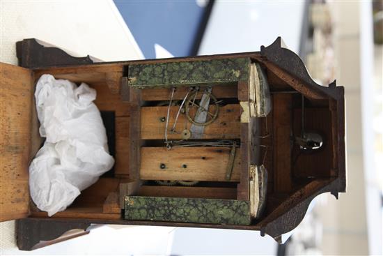 A 19th century Black Forest mahogany mantel clock with automaton and cuckoo, 17.5in.